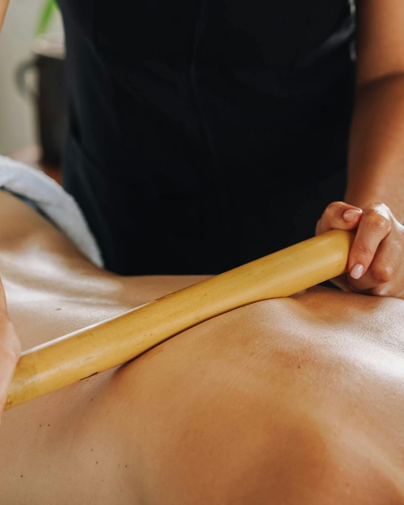 Bamboo back massage in Llandudno at HUSH Therapies using bamboo Sticks